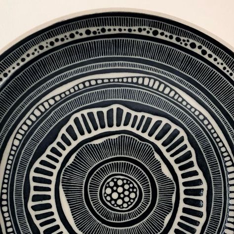 Melanie Landre on Instagram: "🖤 I love doing these plates, it’s my meditation . Black and white sgraffito mandala 34cm plate . #ceramicplate #sgraffito #stoneware #wheelthrownpottery #pottery #ceramics #keramiek #ceramicsfrombelgium #ceramicart" Sgraffito Designs Pattern, Sgraffito Designs, Sgraffito Pottery, Pattern Pottery, Wheel Thrown Pottery, Pottery Ceramics, Sgraffito, Ceramic Design, Block Design