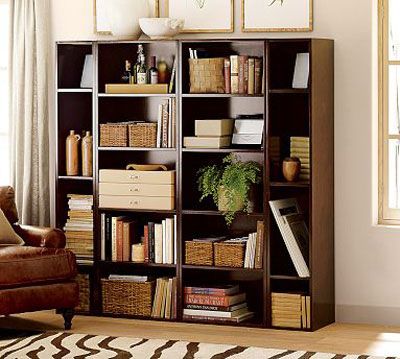 I have way more books. But, I love the baskets, and the plant. This post is awesome for tips on styling your bookcase. Bookcase Decorating Ideas, Pottery Barn Bookcase, Brown Bookshelves, Styling A Bookcase, Modular Bookshelves, Bookcase Diy, White Bookshelves, Decorating Bookshelves, Books Decor