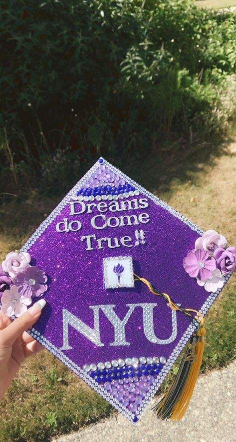 Purple graduation cap Nyc Graduation Cap, Nyu Vision Board, New York University Graduation, Nyu Student Aesthetic Wallpaper, Nyu Grad Cap, Nyu College Aesthetic, New York University Campus, Nyu Medical School Aesthetic, Nyu Campus Aesthetic