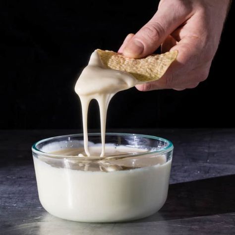 Ultrabeefy Nacho Cheese Sauce - Cook's Illustrated | Cook's Illustrated Best Cheese Dip, Cooks Illustrated Recipes, Cheesy Nachos, Donut Toppings, Caramel Chocolate Bar, Illustrated Recipe, Modernist Cuisine, Cheddar Cheese Sauce, Cookie Toppings