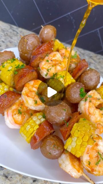 Bri’s Heat 💕 | Food Content Creator on Instagram: "I’ve been wanting to try these seafood boil kabobs and they were everything I thought they would be🤤  What y’all think?  Full recipe on my YouTube channel, click the link on my page to get there.  • • • • • • • • • • • #seafoodboil #shrimpboil #shrimp #corn #kabob #easyrecipes #quickrecipes #dinner #grilling #garlicbutter #cajun #shrimprecipes #shrimpkabobs #explore #explorepage✨ #stlfoodscene #stlfoodie #chicagofood #tasty #tastyfood #foodreels #foodie #foodblogger" Sausage And Shrimp Kabobs, Wedding Kabobs, Shish Kabobs Shrimp, Shrimp Kabobs On The Grill, Seafood Kabobs, Sausage Kabobs, Shrimp Corn, Food Content Creator, Shrimp Kabobs