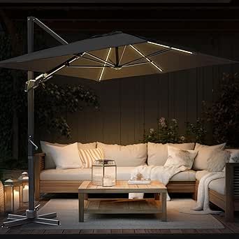 PRICES MAY VARY. ☀️𝐏𝐫𝐞𝐦𝐢𝐮𝐦 𝐐𝐮𝐚𝐥𝐢𝐭𝐲: Experience ultimate durability and UV protection with our garden umbrella 𝟐𝟐𝟎𝐠/𝐦² 𝐟𝐚𝐝𝐞-𝐫𝐞𝐬𝐢𝐬𝐭𝐚𝐧𝐭 𝐩𝐨𝐥𝐲𝐞𝐬𝐭𝐞𝐫 fabric. Its ultra-thick 𝐀��𝐥𝐥-𝐚𝐥𝐮𝐦𝐢𝐧𝐮𝐦 𝐟𝐫𝐚𝐦𝐞 ensures unmatched strength and stability, providing steadfastness even during windy conditions. ☀️𝐔𝐧𝐛𝐞𝐚𝐭𝐚𝐛𝐥𝐞 𝐃𝐮𝐫𝐚𝐛𝐢𝐥𝐢𝐭𝐲 & 𝐒𝐭𝐚𝐛𝐢𝐥𝐢𝐭𝐲: with our cantilever umbrella, featuring 𝐬𝐭𝐚𝐛𝐥𝐞 𝐭𝐫𝐢𝐚𝐧𝐠𝐮𝐥𝐚𝐫 𝐬𝐭𝐫𝐮𝐜𝐭𝐮𝐫𝐞, ? Garden Umbrella Ideas, Patio Covering, Umbrella With Lights, Deck Umbrella, Deck Pool, Cantilever Patio Umbrella, Pool Backyard, Garden Deck, Shade Umbrellas