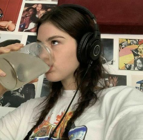 Gracie Abrams, A Girl, A Woman, Headphones, Glass, Wall