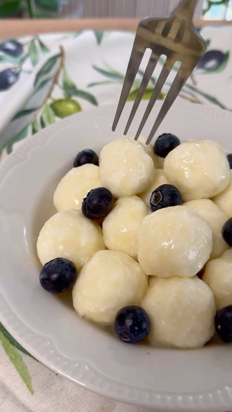 We found this delightful recipe for *Lazy Cottage Cheese Dumplings* 🥟! It's a quick, tasty, and hearty option for breakfast that you'll absolutely love. ✨

🌟 **Ingredients** 👇🏼  
- Cottage Cheese (9%) - 2 packs (180 grams each / 6.5 ounces each)  
- Egg - 1 piece  
- Sugar - 1 tablespoon  
- Rice Flour (or All-Purpose Flour) - 80 grams (3 ounces)  

🥣 **Preparation**  
Mix all ingredients together, knead the dough, form small balls, and drop them into boiling water. Cook for 7-10 minutes. Cottage Cheese Dumplings, Cheese Dumplings, Breakfast Cheese, Tasty Breakfast, Rice Flour, Boiling Water, Cottage Cheese, Yummy Breakfast, Dumplings