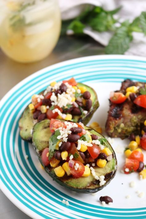 Step up your side grilling game with these easy grilled avocados stuffed with black bean and corn salsa. Grilled Stuffed Avocado Recipes, Grilled Avocados, Grilled Stuffed Peppers, Black Bean And Corn Salsa, Caprese Salad Skewers, Corn Bean Salsa, Stuffed Avocados, Stuffed Avocado, Black Bean And Corn