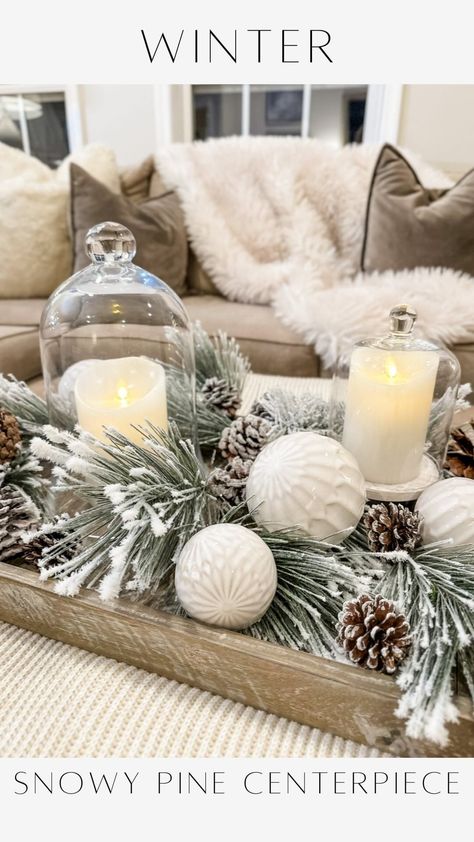 Janine Graff | Snowy Pine Centerpiece ❄️captures the essence of the winter season. I adore the soft glow of candlelight. It’s a challenge to maintain that... | Instagram Winter Decor Centerpiece, Snowy Centerpiece Ideas, Simple Winter Table Centerpieces, Baby It’s Cold Outside Baby Shower Theme Centerpiece, Snow Centerpieces, Winter Candle Centerpieces, Snowman Centerpiece Ideas, Winter Wonderland Centerpieces Diy, Winter Baby Shower Centerpieces