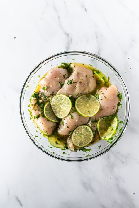 This is truly the most delicious cilantro lime chicken marinade. Made with basic ingredients like olive oil, zesty lime, lots of fresh cilantro, garlic, and spices. Marinate for as little as 15 minutes or up to 1 day– making cilantro lime chicken has never been easier or more flavorful! #chickenmarinade #cilantrolimechicken Lime Chicken Marinade, Cilantro Lime Chicken Marinade, Lime Marinade For Chicken, Chicken Marinade, Cilantro Lime Chicken, Lime Chicken, Chicken Marinades, Cilantro Lime, Fresh Cilantro