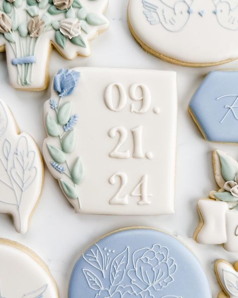 This sweet bridal shower set was winning the polls, so here’s the full set! Swipe to see closeups, including their sweet pups!. My favorite are the simple cookies with the tiny line details. The blue with the white floral, leaf cookie, and the birds were from her invitation! I love this elegant, minimalist, and floral set! . #weddingcookies #bridalshowercookies #bridecookies #floralcookies #flowercookies #somethingbluebridal #bluewedding #springcookies #engagementcookies #ringcookies #dogcoo... Blue And White Bridal Shower Cookies, Love In Bloom Cookies, Blue Bridal Shower Cookies, Blue Wedding Cookies, Blue And White Cookies, Lindsay Johnson, Bride Cookies, Wedding Shower Cookies, Engagement Cookies