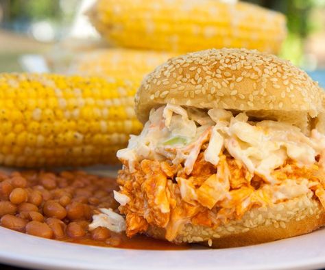 Slow Cooker Buffalo Chicken Sandwiches with Ranch Coleslaw | Recipes Chicken Sandwich With Coleslaw, Buffalo Chicken Crockpot, Sandwich With Coleslaw, Ranch Coleslaw, Slow Cooker Buffalo Chicken, Crockpot Buffalo Chicken, Potato Rolls, Cabbage Salad Recipes, Buffalo Chicken Sandwiches