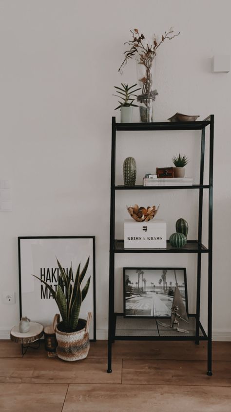 Black White And Green Home Aesthetic, Dark Neutral Apartment Decor, Black And White Shelf Styling, Green And Grey Home Aesthetic, Black White Green Brown Bedroom, Green White And Black Aesthetic, Black White Green Apartment, Black White Green Brown Interior, Green Black Apartment