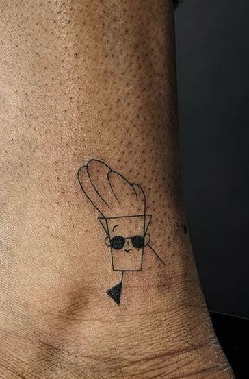 Johnny Bravo Tattoo Johnny Bravo Tattoo Ideas, Johny Bravo Tattoo, Johnny Bravo Tattoo, Small Cartoon Tattoo Ideas, Tatts Ideas, Cartoon Tattoo Ideas, Tattoos 2023, 90s Tattoos, Animated Shows