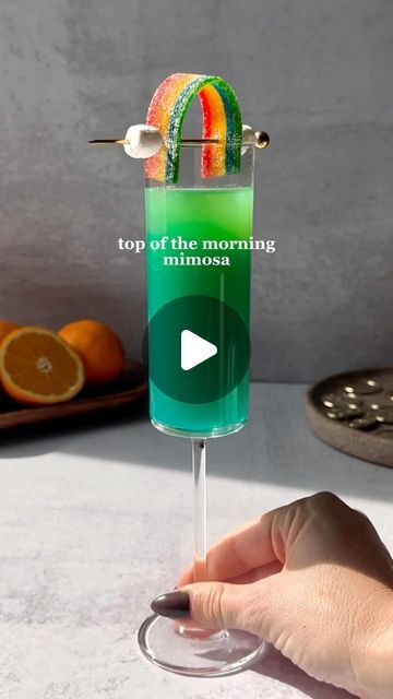 Cocktails (21+ to follow) on Instagram: "Countdown to St. Patrick’s Day with a sip of luck each day! 🍀 Sipping on Top of the Morning Mimosas and spreading Irish cheer! 🌈🥂 @thats.thespirits 
How to make:
1 oz orange juice
Top w/ champagne
Float 1 oz blue curacao
Garnish w/ rainbow belt + marshmallow clouds
Enjoy!
#thatsthespirits #stpaddyssips #stpaddysday #stpatricksday #stpatricks #stpaddysdrinks #drinkrecipe #asmr #mimosa #rainbow #irish #drinkstagram" Leprechaun Mimosa, St Pattys Party, Marshmallow Clouds, St Patricks Food, Champagne Float, Rainbow Belt, Irish Cheers, Rainbow Belts, Top Of The Morning