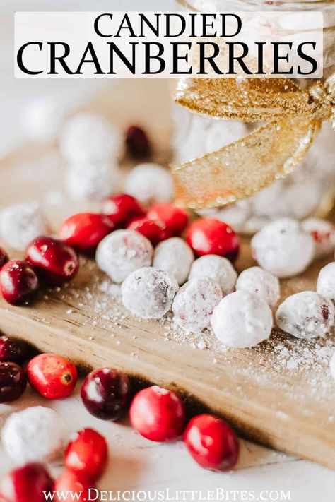 Candied Cranberries are a holiday staple, but this recipe that involves soaking the berries and then coated them in powdered sugar is all the rage thanks to it going viral on Tiktok. You can easily make these pops of sweet and tart delight to enjoy with your friends and family this season. Candied Sugared Cranberries, Tiktok Sugared Cranberries, Candied Cranberries With Sprite, Candies Cranberries Powdered Sugar, Cranberry Snacks Powdered Sugar, Cranberry Popping Candy, Sugared Cranberries Baked, Frosted Cranberries Powdered Sugar, Cranberry Tiktok