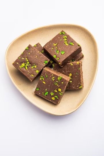 Premium Photo | Chocolate barfi or choco burfi cake a tweak to indian dessert or sweet for festivals Chocolate Barfi Recipe, Chocolate Kulfi Recipe, Chocolate Mithai, Kanafeh Chocolate Bar, Chocolate Barfi, Chocolate Burfi, Indian Dessert, Protein Rich Foods, Indian Desserts