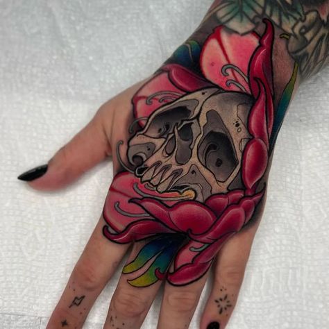 @travisbrown918 | Instagram Skull Flower Hand Tattoo, Neo Traditional Hand Tattoo, Fist Tattoo, Traditional Hand Tattoo, Skull Tattoo Flowers, Eyeball Tattoo, Colour Tattoo, Neotraditional Tattoo, Flower Skull