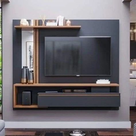 Tv Unit Design idea ✨️ #trendingpost #homedecor #interiordecorating #livingroomdesigns #interiors #reelitfeelit #tvunitdesigns #homedesignsdworld #interior #tvunit #livingroomdesign #wallpanels #interiordesign #fypシ゚viralシ2024fyp #dailylifehacks #easydiy #gardeningtips #housedecoration #dailywear Tv Cabinet Wall Design, Living Room Tv Cabinet Designs, Rak Tv, Modern Tv Room, Modern Tv Unit Designs, Tv Unit Furniture Design, Tv Unit Decor, Wall Unit Designs, Modern Tv Wall Units