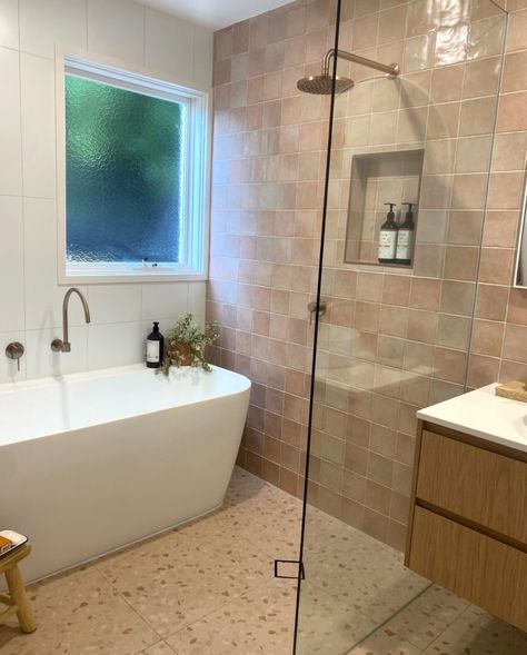 [BEFORE & AFTER] Another killer transformation by @oasis.on.orungal - this time, it's the bathroom 🛁

This beautiful pink bathroom is a far cry from its original design (just swipe and you'll see), and we're so happy to have been a part of its glow up! What do you love most about this transformation? 

Feature tiles: 100x100 Tetra Pavilion Melba
Wall tiles: 300x600 Matte White Rectified
Floor tiles: 600x600 Elona Rose Terrazzo Far Cry, Feature Tiles, Pink Bathroom, Floor Tiles, Bathroom Renovations, Glow Up?, So Happy, Wall Tiles, Original Design