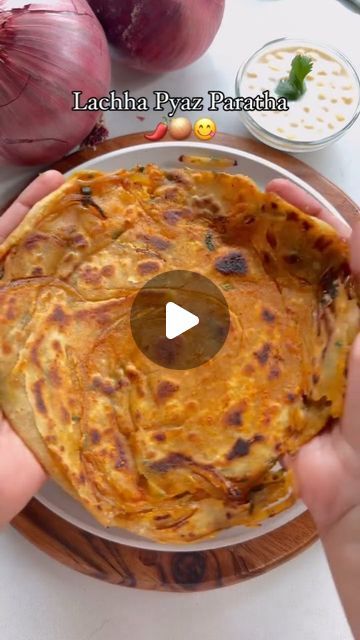 𝒫ℴℴ𝒿𝒶 🐾 on Instagram: "Lachha pyaz ka lachha paratha😍😋🌶️!! Aaj hi banakar khana, majja aajaega😋😁🌺

Ingredients used
🌺-Whole wheat flour dough-Onions-coriander-red chili powder-turmeric powder-coriander powder-salt🌺
Recipe🌺
1. In a bowl, mix together the thinly sliced onions (lachhe) with red chili powder, turmeric powder, coriander powder, salt, and chopped coriander leaves. Adjust the spice levels according to your preference.
2. Roll out a portion of whole wheat flour dough into a circle to make a regular roti.
3. Place a generous amount of the onion-spice mixture in the center of the rolled-out roti.
4. Roll the roti as shown in the video. 
5. Make a cut & roll again. 
6. Dust the rolled paratha with some wheat flour to prevent sticking.
7. Heat a tawa or griddle over mediu Whole Wheat Roti Recipe, Whole Wheat Roti, Indian Bread Roti, Jowar Roti, Lachha Paratha, Turmeric Powder, Indian Bread, No Salt Recipes, Coriander Powder