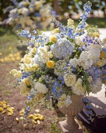 Colorful Timeless Wedding, Yellow And Periwinkle Wedding, Light Blue And Pastel Yellow Wedding, Blue White Yellow Flower Arrangements, Sage Green And Pastel Yellow Wedding, Blue And Yellow Flower Arrangements Wedding Ideas, Blue And Yellow Wildflower Wedding, Wedding Flowers Blue And Yellow, Dusty Blue And Pale Yellow Wedding Theme