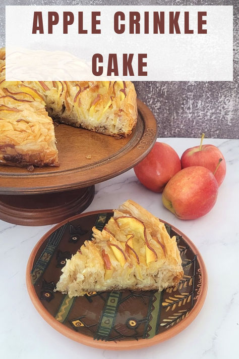 This recipe for an Apple Crinkle Cake creates a dessert with juicy apple slices, a flaky top, honey-sweetened walnuts and a cinnamon-spiced custard. Though it may seem complicated, just follow the recipe, and you'll have a delicious dessert in no time. A crinkle cake is a dessert known for its unique, crinkled texture on the surface. The folds of phyllo dough give it a slightly wrinkled, crinkly appearance. Try this Apple Crinkle Cake Recipe! Apple Phyllo Crinkle Cake, Apple Honey Dessert, Phyllo Crinkle Dessert, Crinkle Cakes, Phyllo Crinkle, Crinkle Cake, Honey Dessert, Creamed Honey, Phyllo Dough