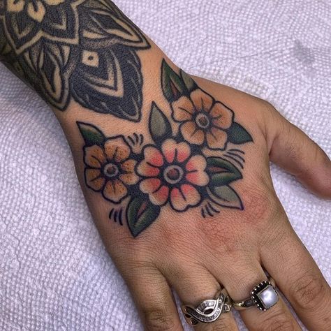 Elisia Lee on Instagram: "Couple recent smaller ones, thanks for getting tattooed 🤍 have some news coming up this week, stay tuned 🌞" Gap Filler Tattoos Women, Botanical Tattoo Traditional, Top Of Wrist Tattoos Traditional, Traditional Flag Tattoo, Scatter Tattoos, Floral Cuff Tattoo, Narrow Tattoo Ideas, Top Of Wrist Tattoos, American Traditional Filler Tattoo