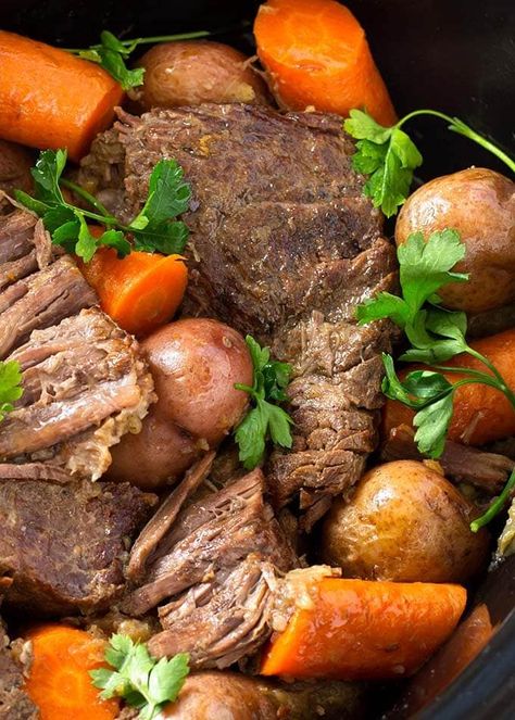 Awesome Slow Cooker Pot Roast recipe full of beefy, oniony flavor. A beef chuck roast cooked low and slow until the meat is a fork tender awesome crock pot pot roast recipe. simplyhappyfoodie.com #slowcookerpotroast #crockpotpotroast Simply Happy Foodie, Crockpot Pot Roast, Slow Cooker Pot Roast Recipes, Root Vegetables Recipes, Slow Cooker Pot Roast, Scalloped Potatoes Cheesy, Slow Cooker Tacos, Pot Roast Slow Cooker, Instant Pot Pork