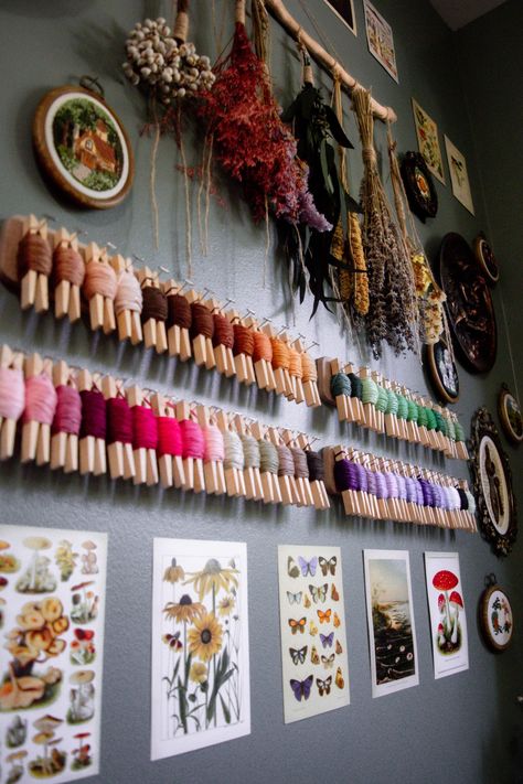 Fiber Artist Studio Wall - @FinelyTwined Embroidery Thread Storage Artist Setup Art Rooms, Craft Room Cottagecore, Fiber Artist Studio, Fiber Arts Aesthetic, Embroidery Studio Craft Rooms, Witchy Art Studio, Whimsical Art Studio, Etheral Bedroom, Embroidery Floss Storage Ideas