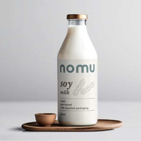 Introducing Nomu - an alternative, vegan milk brand offering Almond, Soy and Oat milks. I had fun creating this passion project - thank you to @briefclub for the brief! . . . . . . . . #briefclub #passionproject #veganmilk #brandidentitydesign #graphicdesigner #packagingdesign #graphicdesignisfun #blackbritishgraphicdesigner #adobeillustrator #adobephotoshop #femalegraphicdesigner #adobecreativecloud Bottle Photography, Milk Brands, Graphic Desi, Vegan Milk, Branding Inspo, Milk Alternatives, Adobe Creative Cloud, Street Design, Soy Milk