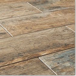 Laminate flooring has gained popularity due to its low-maintenance track record. It's become the affordable option for those wanting a beautiful wood floor on a budget. After applying a stain, the laminate floor takes on all the beauty of a hardwood floor, minus the hassle. The range of colors is as varied as traditional wood products, and the... Contemporary Tile Floor, Wood Tile Floors, Wood Look Tile, Room Flooring, Wood Tile, Wood Flooring, Basement Remodeling, House Flooring, Wood Planks