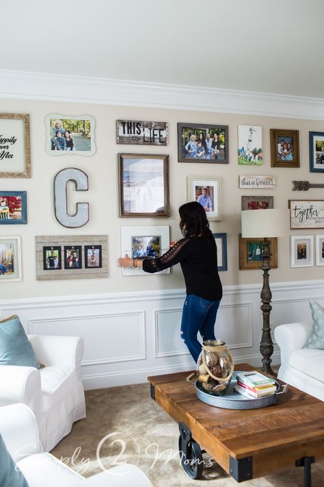 Create a large gallery wall that spans two walls with these easy to follow steps. This farmhouse gallery wall is a mix of wood frames, canvas prints and quotes.#gallerywall #decoratingwithphotos #farmhousedecor #photowall #memorywall #wrapgallerywall Photo Wall Collage Living Room Farmhouse, Canvas And Frame Gallery Wall, Modern Farmhouse Photo Wall, Family Pictures On Wall Farmhouse, Family Gallery Wall Living Rooms Farmhouse, Rustic Farmhouse Gallery Wall, Farmhouse Wall Decor With Family Photos, Large Gallery Wall Living Rooms, Farmhouse Picture Wall