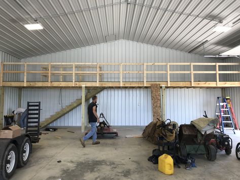 Pole barn loft. Hidden stairs. 6.5 ft x 42 ft. Storage above and below Metal Building Organization Garage, Loft In Garage Ideas, Garage Mezzanine Storage, Loft In Shop Ideas, Shed Mezzanine Ideas, Garage Mezzanine Ideas, Loft In Garage, Pole Barn Garage Interior, Garage Loft Storage