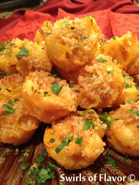 Our Mac and Cheese Bites recipe begins with a box of macaroni and cheese with creamy cheddar sauce. By adding just a few more ingredients and baking in mini muffin cups you’ll have a cheesy bite size appetizer that will be the hit of any get together, and oh so easy to make! #swirlsofflavor #macaroniandcheese #macandcheese #easy #recipe #appetizer #fromamix Mini Mac N Cheese Cups, Macaroni And Cheese Appetizer Party Appetizers, Macaroni And Cheese Bites Appetizers, Homemade Mac And Cheese Bites, Fancy Box Mac And Cheese, Mac Cheese Bites Appetizers, Mac And Cheese Bites Easy, Bunko Food, Mac N Cheese Bites