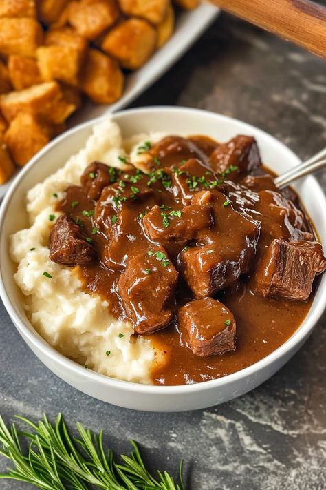 These Crock Pot beef tips and gravy are melt-in-your-mouth tender, smothered in a rich and savory gravy. Perfect for serving over mashed potatoes, rice, or noodles, this hearty dish is the ultimate comfort meal for busy nights. Satisfy your cravings – grab the full recipe #crockpotrecipes #beeftips #comfortfood #slowcookermeals #gravyrecipe #easyrecipes #heartymeals #weeknightdinner Beeftips Recipe Crockpot Easy, Kettle Beef Recipe Crock Pot, Beef Tips Crock Pot Recipes Slow Cooker, Beeftips Recipe Crockpot, Crockpot Beef Stew Easy Crock Pot, Stew Meat Recipes Crock Pot Easy, Beef Tips And Gravy Crockpot, Crock Pot Beef Recipes, Beef Tips Recipes