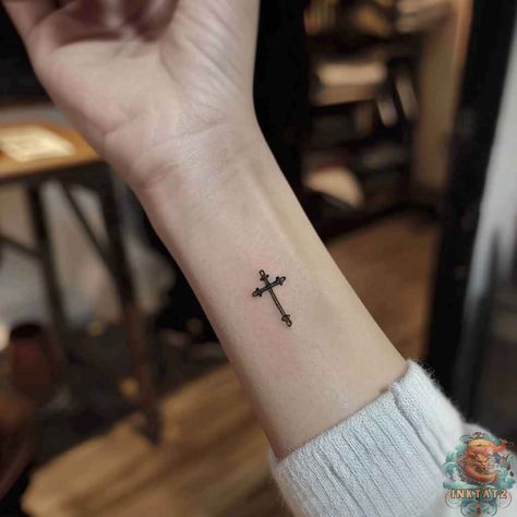 Unlocking the Meaning: The Intriguing World of Cross on Wrist Tattoos: 86 Designs - inktat2.com Cross On Wrist Tattoo, Wrist Cross Tattoo, Cross On Wrist, The Crucifixion Of Jesus, Cross With Wings, Infinity Cross, Timeless Tattoo, Tattoo Spots, The Crucifixion