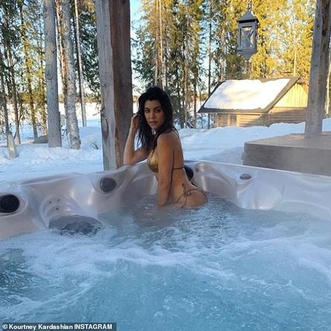 Kourtney Kardashian sizzles in gold bikini as she soaks in a hot tub in throwback Finland snap | Daily Mail Online Photo Splash, Kourtney Kardashian Instagram, Kendall Jenner Instagram, Metallic Swimsuit, Snow Photoshoot, Snow Pictures, Snow Trip, Hot Tub Outdoor, Kris Jenner