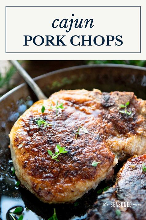 Tender and juicy pan-fried Cajun pork chops are a delicious, affordable, and easy weeknight dinner -- with just 5 minutes of prep! Pair them with cheese grits, cornbread, and cabbage apple slaw for a cozy, restaurant-quality meal that the whole family will love. Pan Cooked Pork Chops, Cabbage Apple Slaw, Cajun Pork Chops, Cajun Pork, Pan Fried Pork Chops, Salt Free Seasoning, Apple Slaw, Cheese Grits, Fried Pork Chops