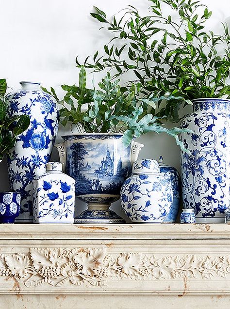 A collection of chinoiserie ceramics in every shape and size turns the fireplace into a striking focal point. Ginger Jars Decor, Blue And White Vases, Styl Hampton, Blue And White Chinoiserie, Blue White Decor, Blue And White Vase, White Pottery, Blue And White China, White Rooms