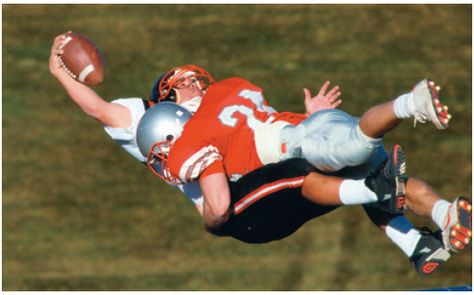 These football players are an example of an inelastic collision. The people collide and stick together which causes their speed to decrease and their mass to increase. The momentum is transferred and conserved, but KE is not conserved and it changes into other forms of energy. The equation for inelastic collisions is m1v1i+m2v2i=(m1+m2)vf. Tackling Drills, Tackle Football, Messi Gif, Worms Eye View, College Football Players, Monday Night Football, Football Images, Football Photos, Sports Images