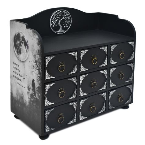 PRICES MAY VARY. Discover a gothic drawer organizer designed for goth fans. This jewelry box holds makeup, desk accessories, and small supplies. Perfect for dark academia, it fits any vanity. Crafted in a black, gothic style with 9 drawers, it's ideal for office organization and storing necklaces, earrings, and beads. A true homage to Edgar Allan Poe's "The Raven." Decorative and functional, it features a crow, a tree of life, and medieval, witchy elements. This wooden box adds victorian goth de Witchy Maximalist Decor, Gothic Victorian Home Decor, Gothic Office Decor, Edgar Allan Poe Poems, Gothic Apartment Decor, Clutter Decor, Goth Furniture, Witchy Elements, Gothic Rooms