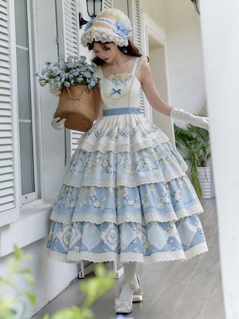 This enchanting piece features a delicate daisy and flower basket print, adding a touch of whimsical charm. The smocked back ensures a comfortable and flattering fit, while the tiered skirt design provides a graceful silhouette. Perfect for tea parties, garden strolls, or any occasion that calls for classic Lolita sophistication. SizeSMLFull Length117-120120-123123-126Bust78-9083-9588-100Waist62-7467-7972-84Hem Circumference330340350 Fluffy Clothes, Dream Daughter, Tea Party Outfit, Ouji Fashion, Kawaii Outfits, Embroidery Neckline, Daisy Embroidery, Gothic Skirts, Classic Lolita