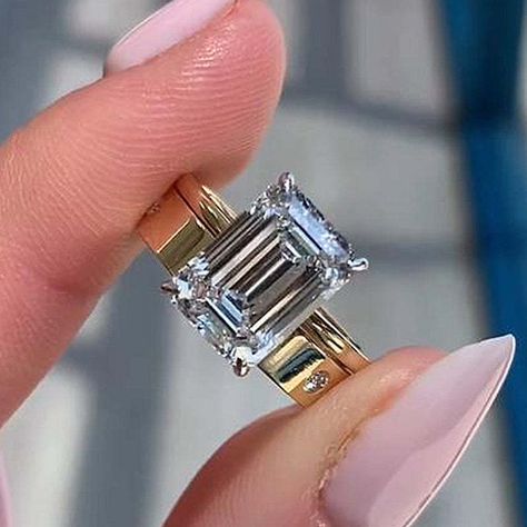 Rose gold emerald cut engagement ring