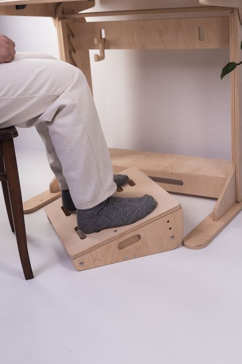 Give your legs a lift with our ergonomic wooden footrest! 🌟 This adjustable foot rest fits perfectly under your desk, offering ultimate leg support and comfort. Ideal for home offices and work-from-home setups, our foot stool enhances your workspace with its stylish design and practicality. Treat yourself or gift it to your favorite coworker--it's the perfect office gift! 🎁 Elevate your office furniture game and enjoy a more comfortable workday with our premium foot riser. 🦶💼  ✏️ About produ Stool Chair Design, Foot Rest Under Desk, Desk Build, Favorite Coworker, Ergonomics Furniture, Perfect Office, Work Space Organization, Leg Rest, Woodworking Classes