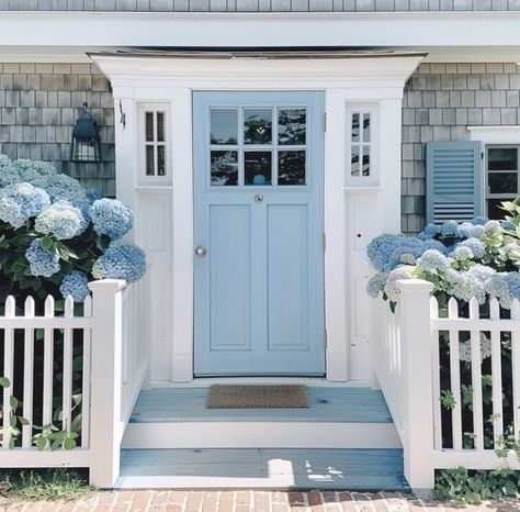 Coastal Homes Exteriors, Beach Bungalow Exterior, Colorful Front Door, Beach House Front Door, Coastal Home Exterior, Cozy English Cottage, Cottage Front Doors, White Exterior Houses, Blue Front Door