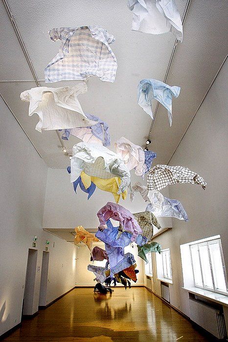 Textile Installation Art, Clothing Art Installation, Hanging Installation Art, Clothing Installation, Floating Clothes, Installation Art Ideas, Flying Clothes, Sustainable Installation Art, Art Installation Ideas