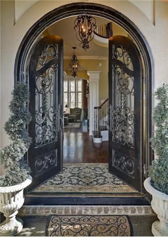 Mediterranean, Tuscan dream home. arched doorway with decorative ironwork in doors. DesignNashville.com offers custom draperies and home accents for this style home. (shipping to you) Door Entryway, Casas Coloniales, Front Door Design, Entry Way, Unique Doors, Iron Doors, Grand Entrance, Beautiful Doors, House Entrance