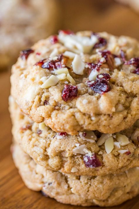 I ADORE these Cranberry Almond White Chocolate Chunk Cookies! They bake up thick and chewy, with a rich, sweet buttery flavor studded with tangy bits of cranberry! White Chocolate Oatmeal Cranberry Cookie, Cranberry Almond Cookies, Cookies Cranberry, Cranberry Oatmeal Cookies, Cranberry Chocolate, Cranberry Oatmeal, Cranberry Baking, Oatmeal Cranberry Cookies, Almond Cookie