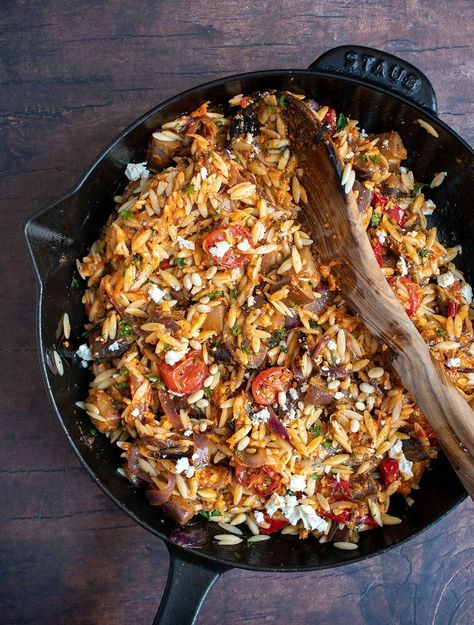 With summer produce quickly disappearing, it's the perfect time to use what's still in season while they're still available! Roast some bell peppers and cherry tomatoes to make a savory romesco sauce and use that sauce to make one delicious romesco orzo pasta salad. This salad has it all from buttery orzo to charred tomatoes, caramelized eggplants, crumbled feta, fresh herbs, toasted pine nuts, and of course, the romesco sauce. This can be served as a side dish or main dish, great for… Romesco Sauce Uses, Roasted Garlic Hummus Recipe, Orzo Pasta Salad Recipe, Veggie Skillet, Pumpkin Chili Recipe, Romesco Sauce, Pumpkin Chili, Orzo Pasta Salad, Orzo Pasta