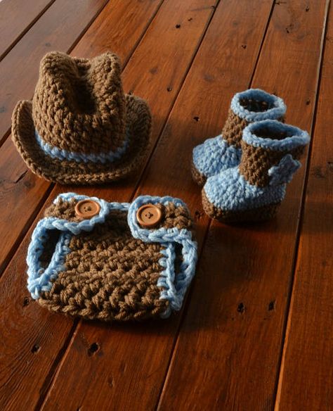 If you are looking for a baby cowboy outfit, you will love the crocheted boots, hat and diaper cover. This cute baby cowboy outfit is the perfect outfit for your baby photos. This baby cowboy outfit is made from acrylic yarn in brown and blue colors. To reduce the cost of shipping for my buyers Crochet Cowboy Boots, Newborn Cowboy, Baby Cowboy Hat, Cowboy Baby Clothes, Crochet Cowboy Hats, Baby Boy Cowboy, Fuchs Baby, Baby Cowboy Boots, Crochet Baby Photo Prop