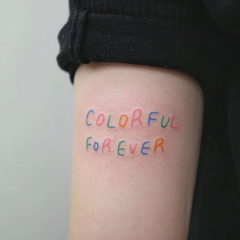 Colorful forever lettering tattoo Lettering Tattoos, Bright Tattoos, Rainbow Tattoos, Lettering Tattoo, Text Tattoo, Dainty Tattoos, Aesthetic Tattoo, Time Tattoos, Small Tattoo