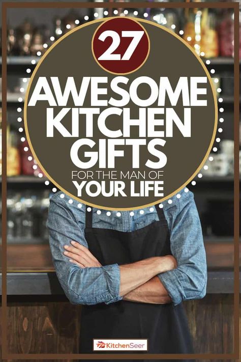 Man with attractive beard wearing black apron as a kitchen gift to him, 27 Awesome Kitchen Gifts for the Man in Your Life. In this post, you'll find some crazy gift ideas that will surely fit your budget and your boyfriend or dad will surely like it. There are also DIY gifts that you can seek through the internet, but if you're in a hurry, why not order one that's ready for you on our site? You will surely love there cooking gifts ready for your choosing.